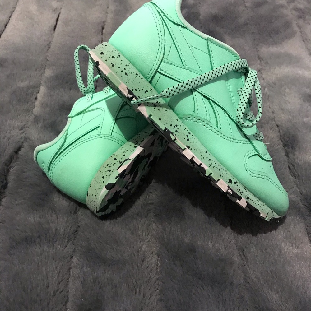 Reebok sneakers.